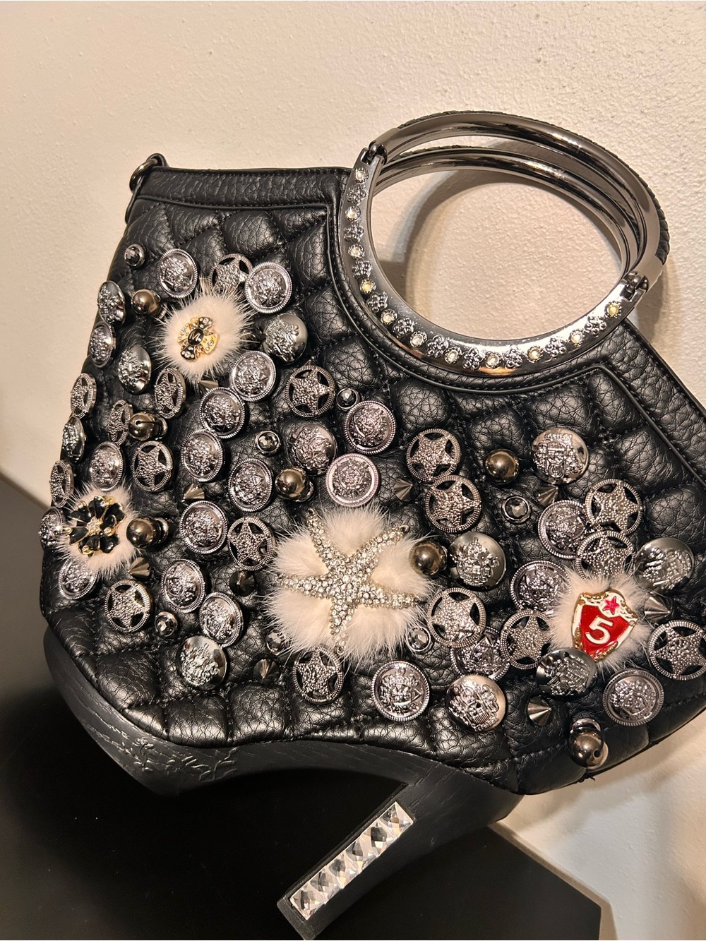 Embellished Black Heel Handbag with Star Accents